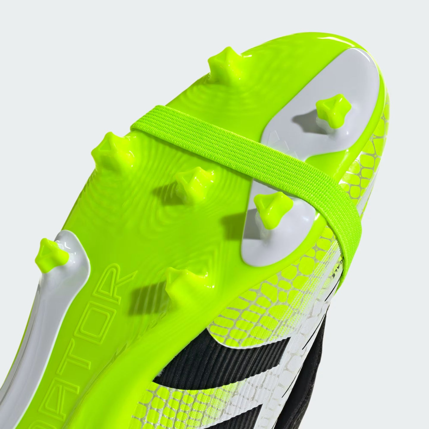 Outsole view of adidas Predator League JP9916 showing FG/MG studs