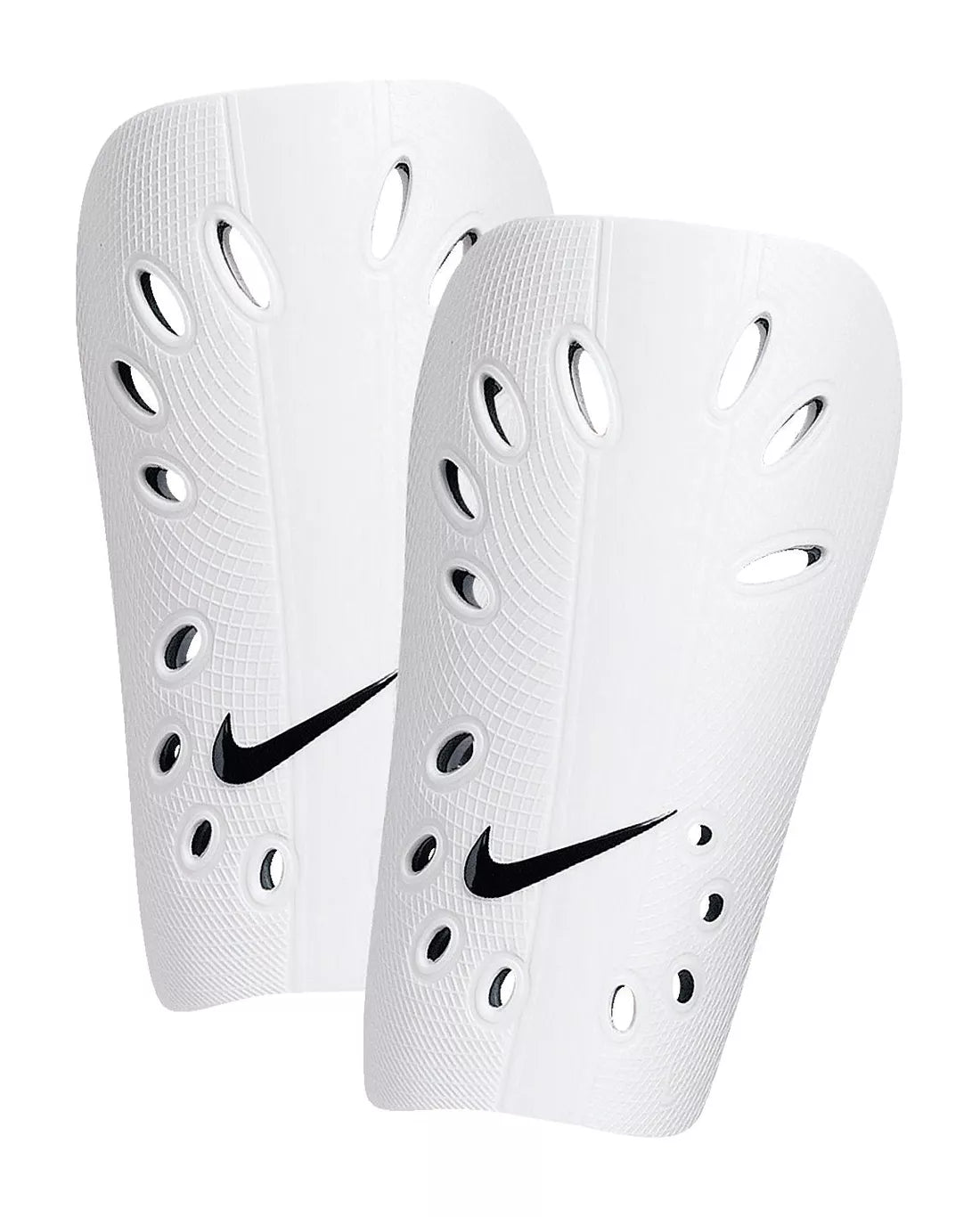 Pair of white shin guards with Nike logo on a white background