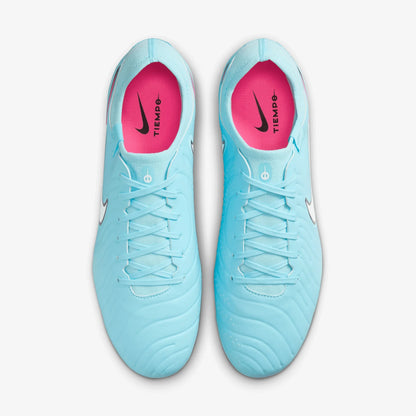 Pair of light blue soccer cleats with pink lining on a white background