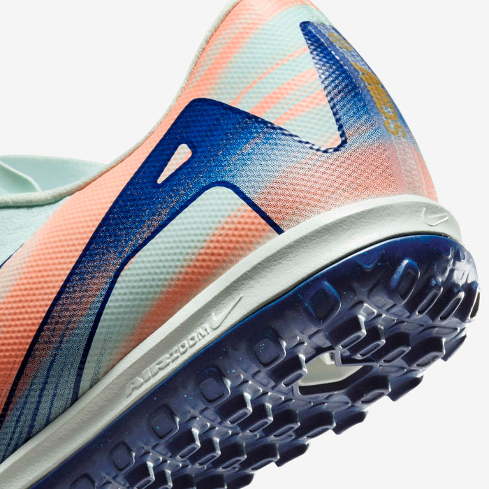 Close-up of Nike Phantom GX 2 Academy FG/MG grip texture and Honeycomb Green finish