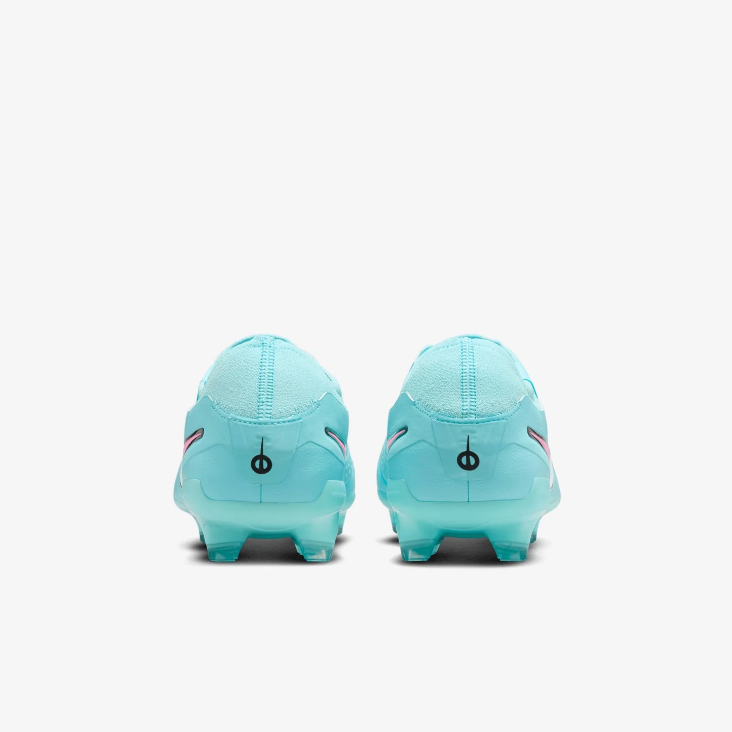 Pair of light blue soccer cleats on a white background