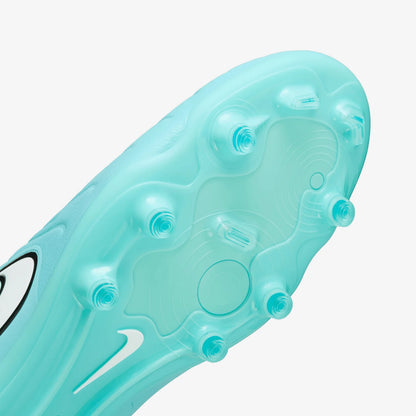 Close-up of a light blue soccer cleat sole with Nike logo on a white background