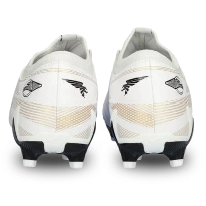 White soccer cleats with black accents on a white background
