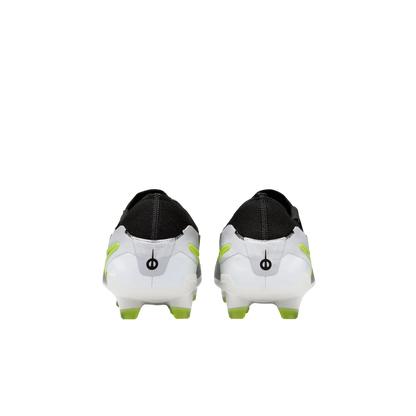 White soccer cleats with black and green accents on a white background