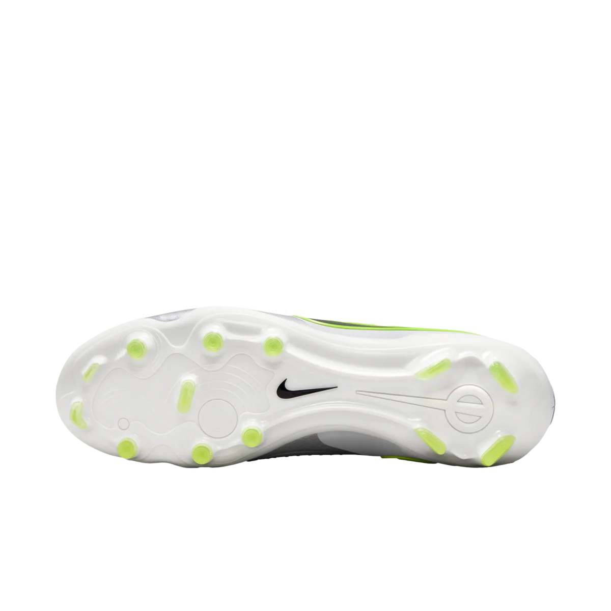 White athletic shoe with green accents on a white background