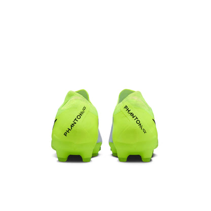 Pair of bright green soccer cleats with 'Phantom' branding on a white background