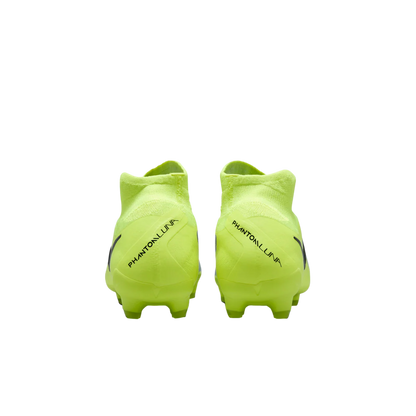 Pair of bright green soccer cleats with 'Phantom' branding on a white background
