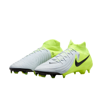 Pair of soccer cleats with a bright yellow and gray design on a white background