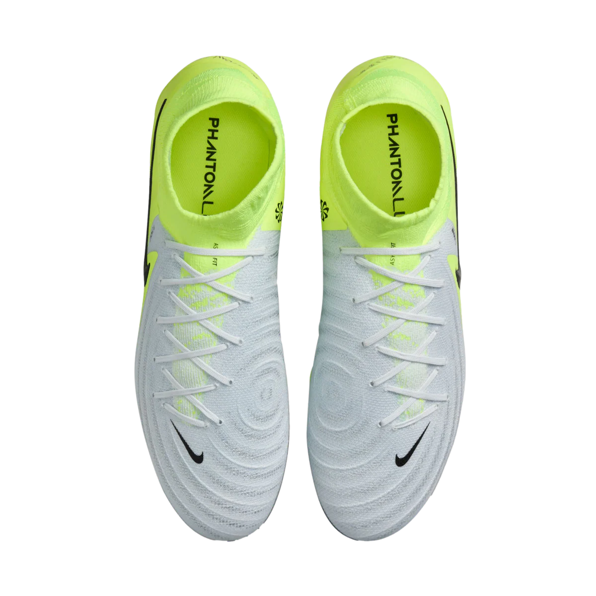 Pair of white soccer cleats with neon green accents on a white background