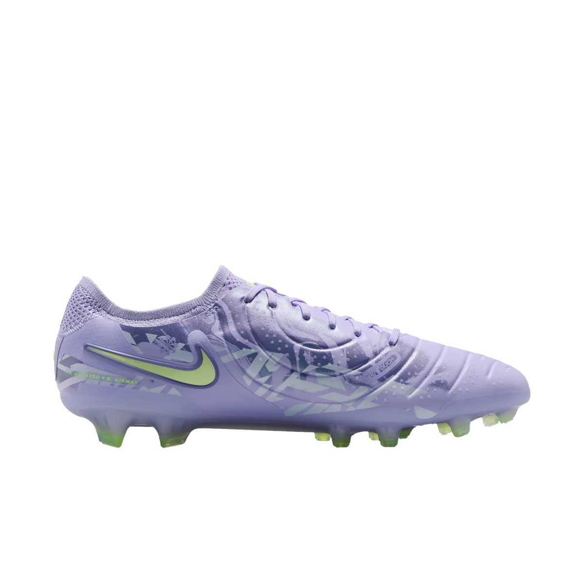Purple soccer cleat with green accents on a white background