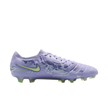 Purple soccer cleat with green accents on a white background