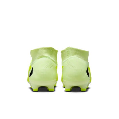 Pair of green soccer cleats on a white background