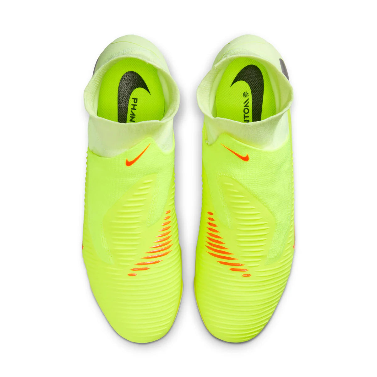 Pair of bright green soccer cleats with Nike logo on a white background