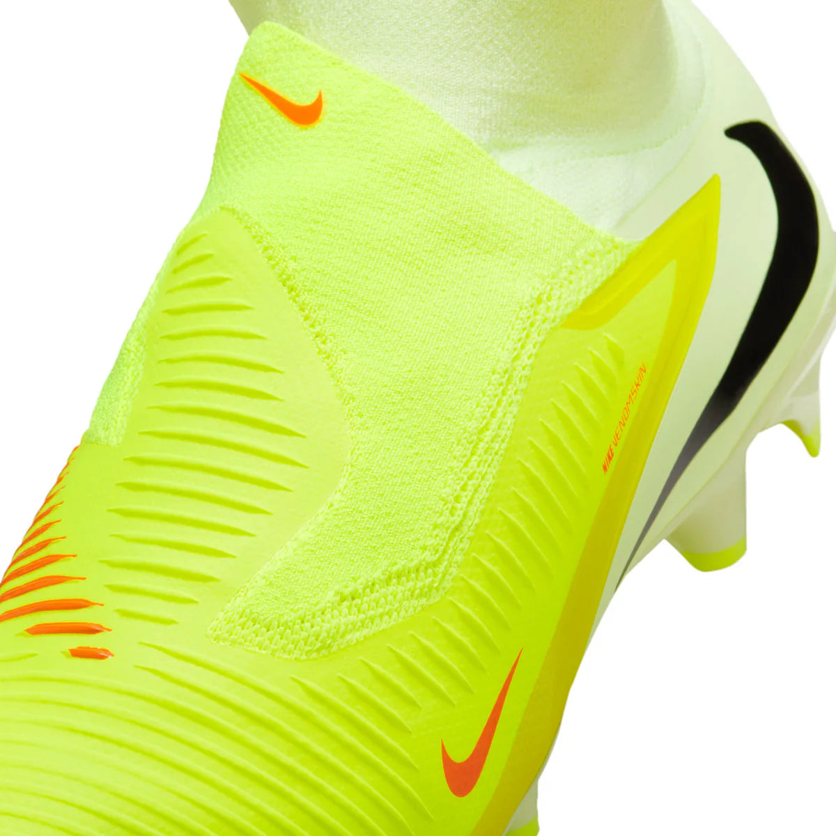 Bright yellow soccer cleat with Nike logo on a white background