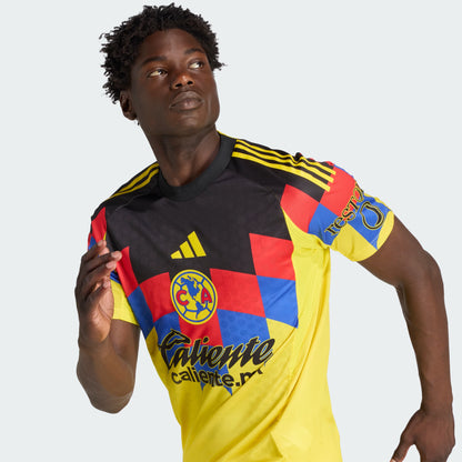 Person wearing a colorful sports jersey with brand logos on a light gray background