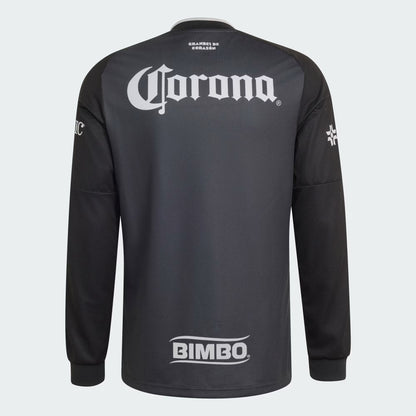 A dark gray long-sleeve jersey shown from the back, featuring a large white 'Corona' logo across the upper back and a white 'BIMBO' logo near the lower hem.