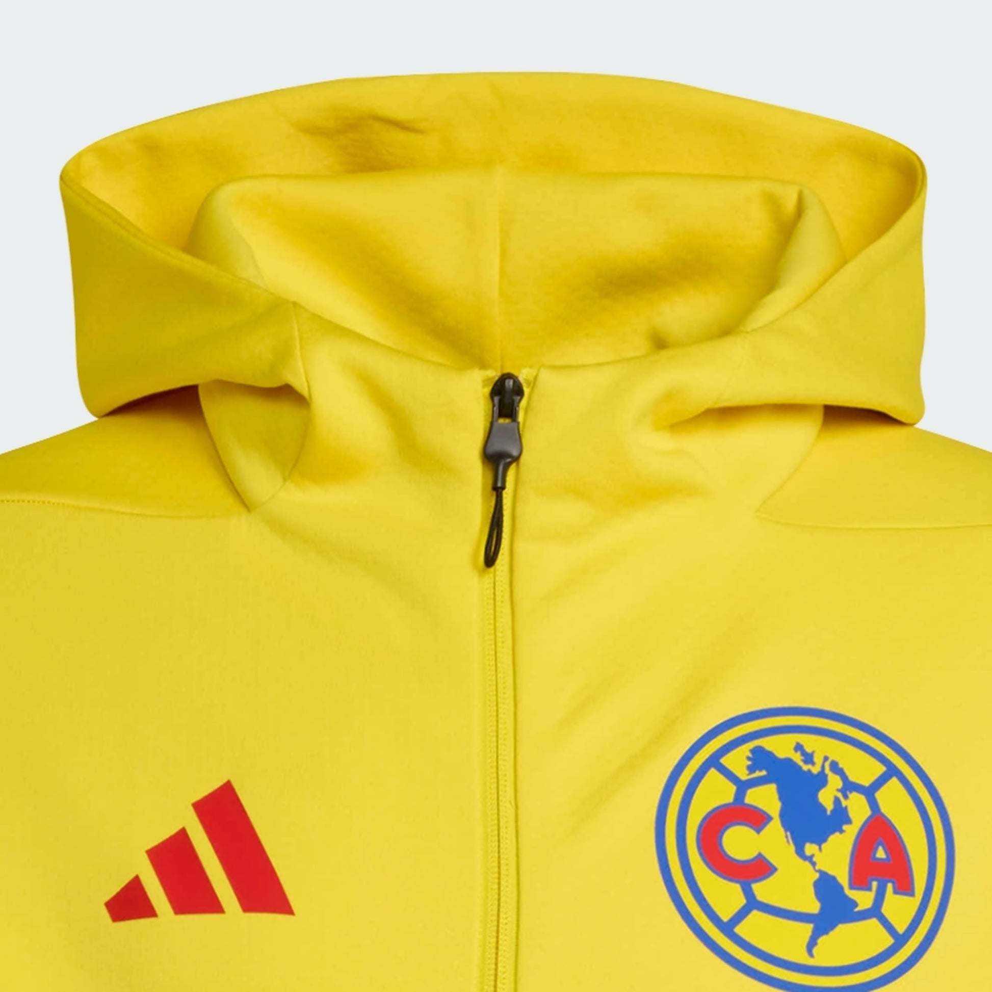 Yellow hoodie with Adidas logo and Club América emblem on a light gray background