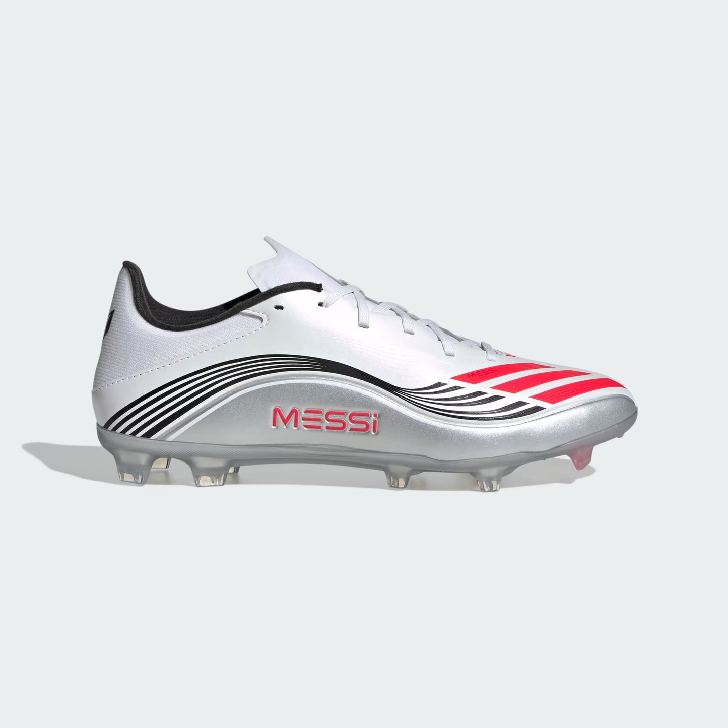 White soccer cleat with black and red accents on a light gray background