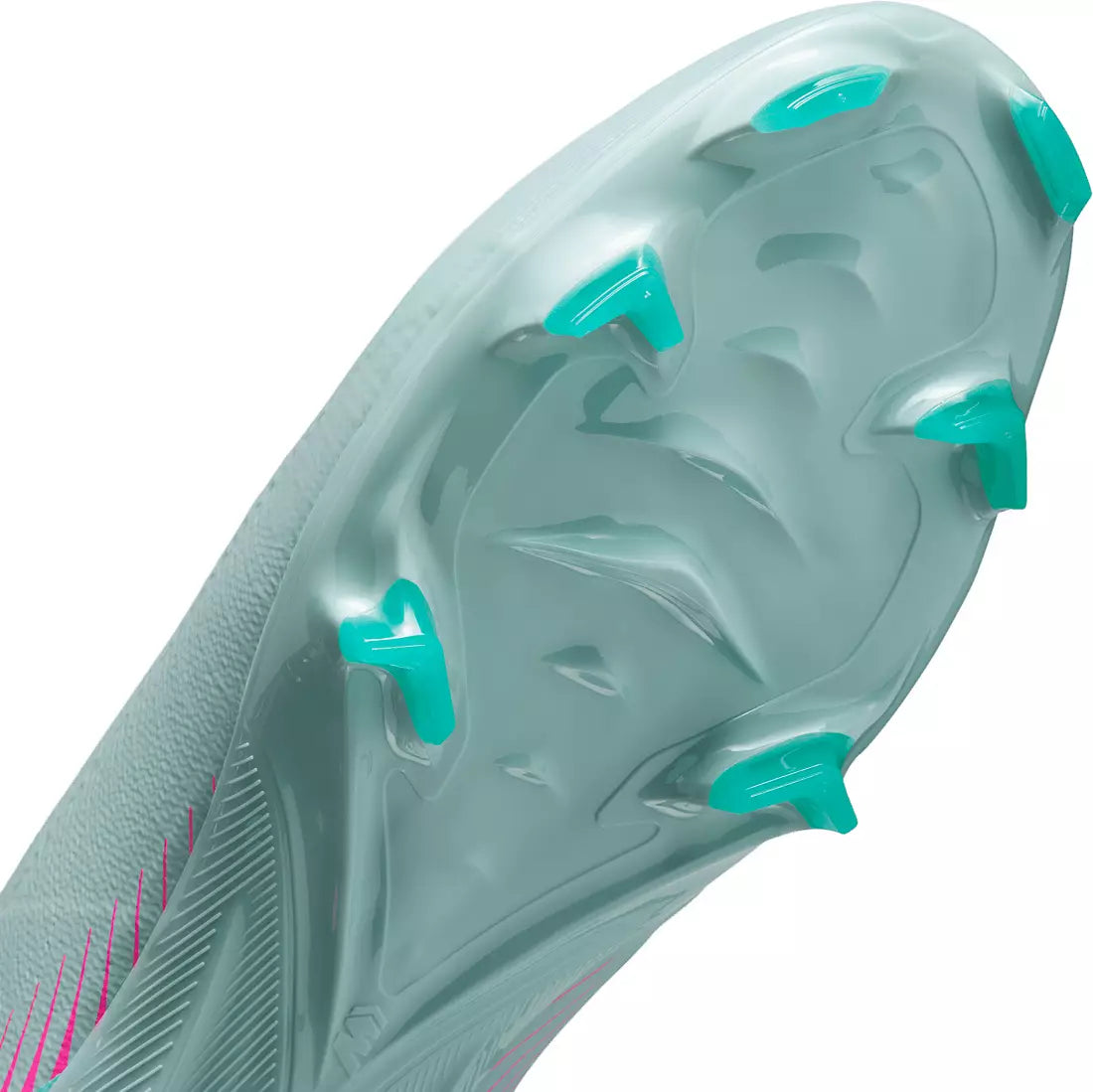 Close-up of a sports shoe sole with green accents on a white background
