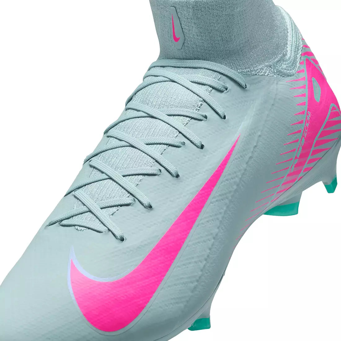 Gray and pink soccer cleat with Nike logo on a white background