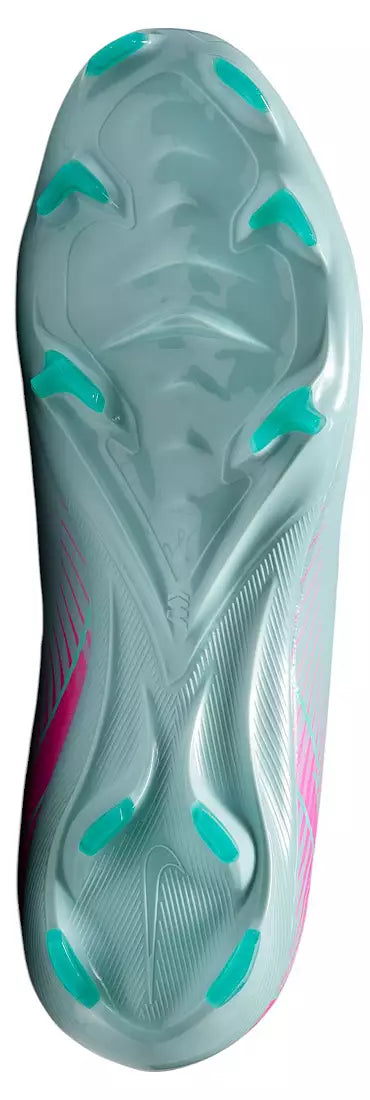 Clear athletic shoe sole with green and pink accents on a white background