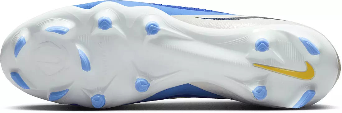 Close-up of a white sports shoe with blue accents and a yellow logo on a white background