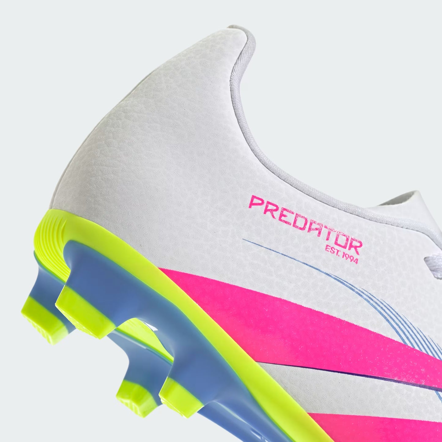 Close-up of a soccer cleat with 'Predator' branding on a white background