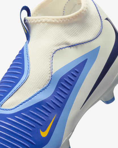 Close-up of a blue and white sports shoe with a yellow Nike logo on a white background