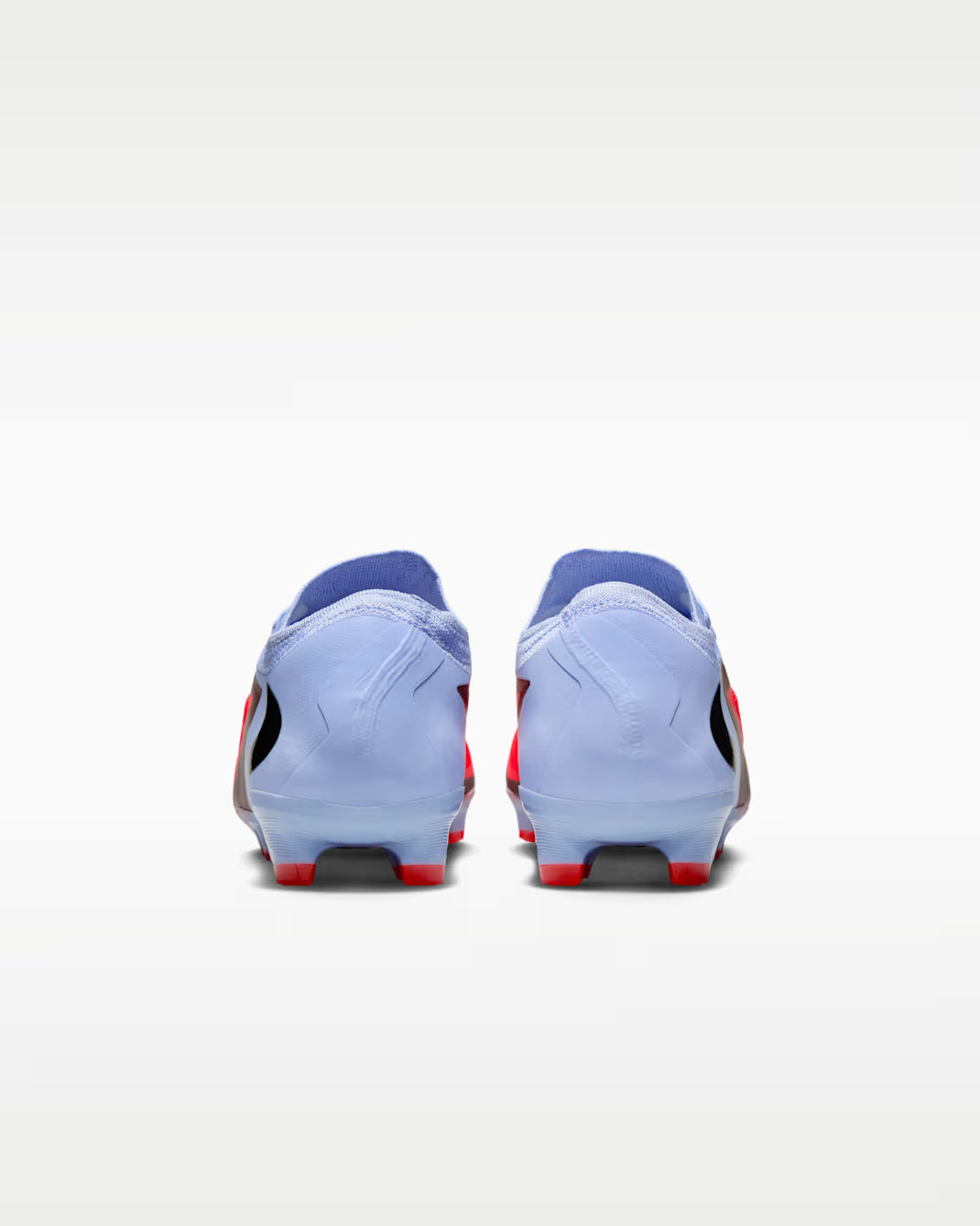 Pair of soccer cleats on a white background