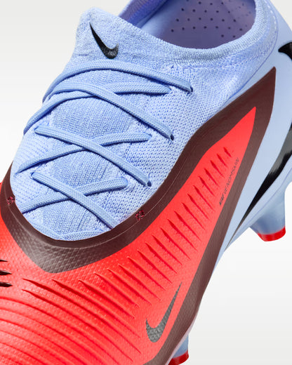 Multicolored sports shoe with Nike logo on a white background