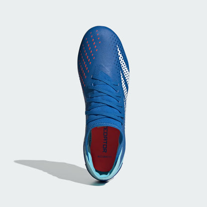 Blue soccer cleat with red accents on a light gray background
