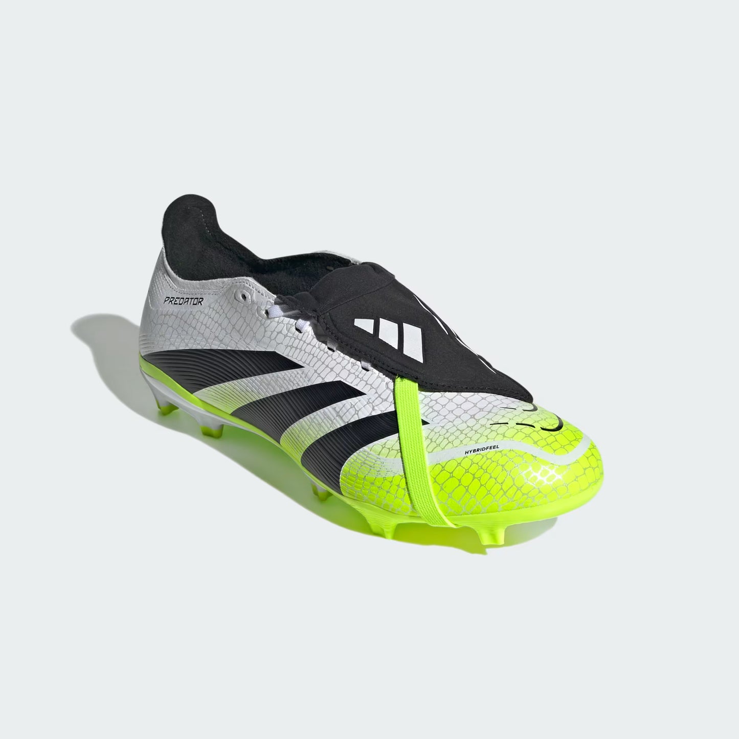 Adidas sprint shoe with black and white design on a light gray background
