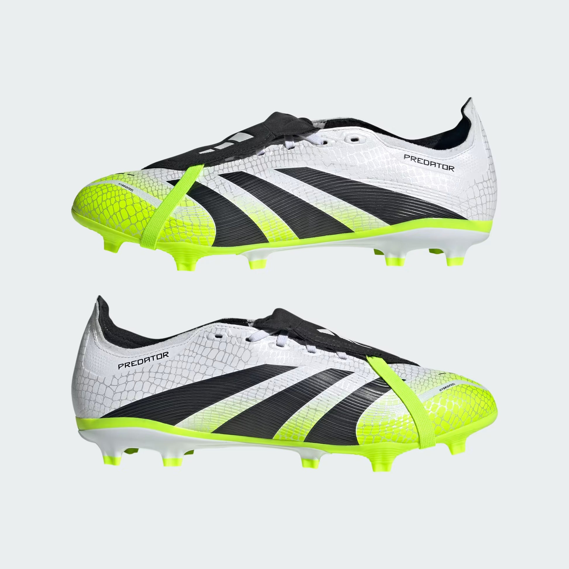 Pair of Adidas Predator soccer cleats with white, black, and neon green design on a light gray background.