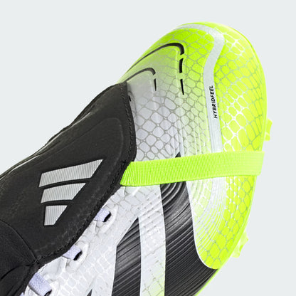 Close-up of a sports shoe with black, white, and neon green colors on a light gray background.