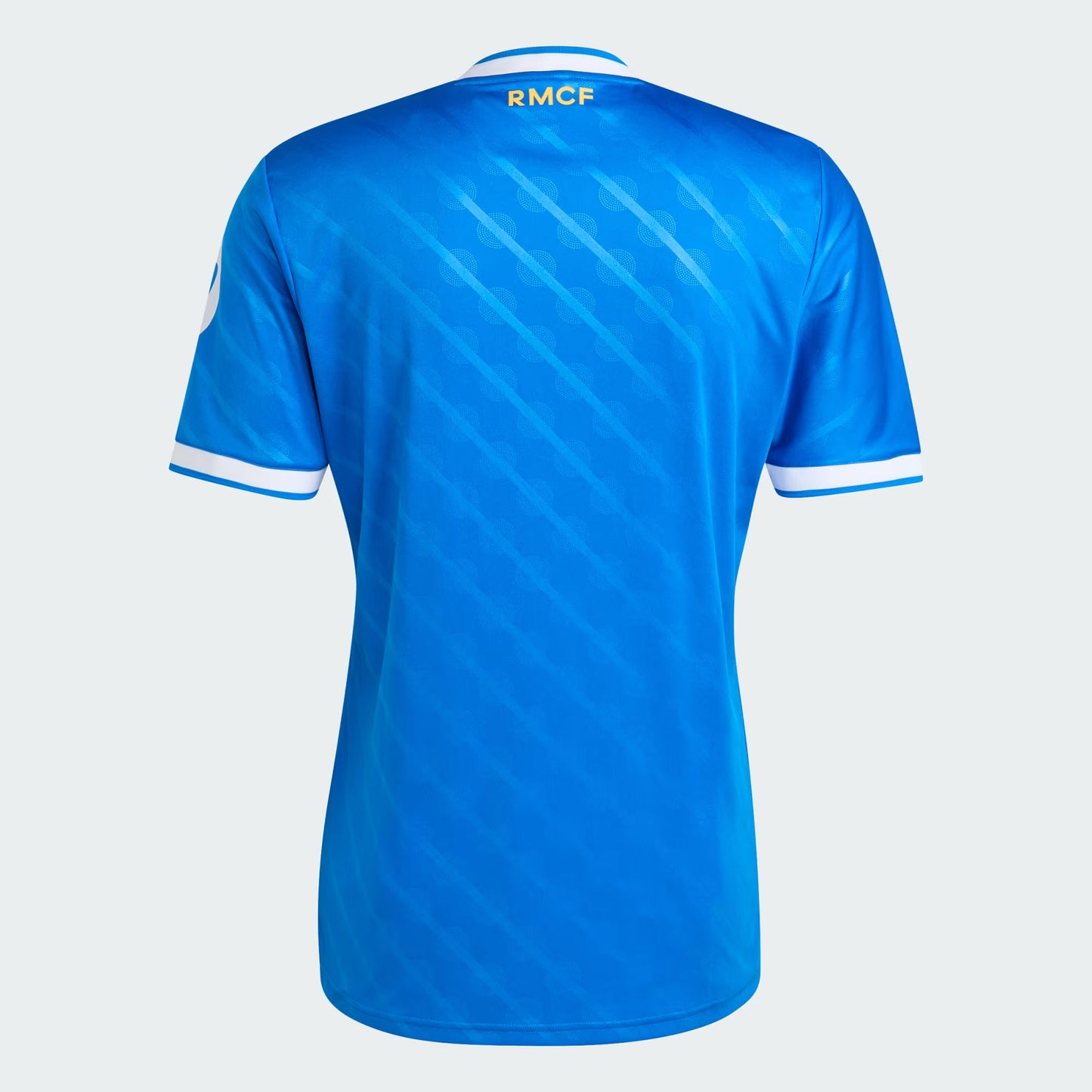 Blue sports jersey with 'RMCF' branding on a white background