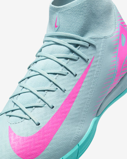 Angled view of Nike Superfly 10 Academy IC in Ocean Cube Pink Blast