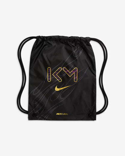Black drawstring bag with yellow and purple text and Nike logo on a light gray background