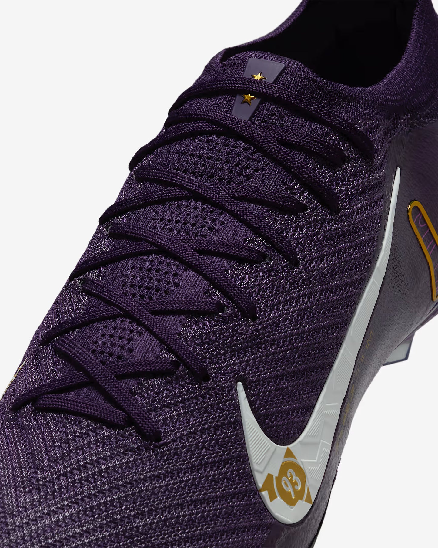 Purple sports shoe with a white logo on a light gray background