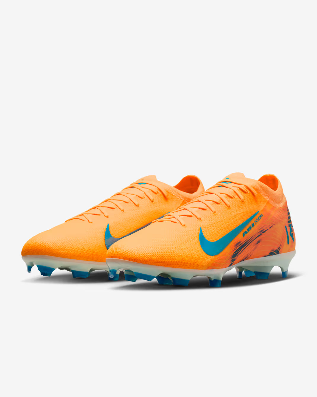 Orange soccer cleats with blue accents on a white background