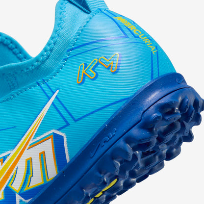 Blue sports shoe with yellow and white branding on a white background