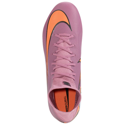 Pink soccer shoe with orange accents on a white background
