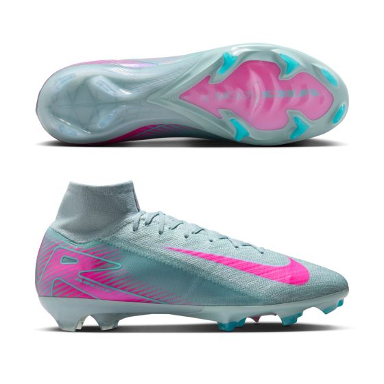 Light blue and pink soccer cleats on a white background