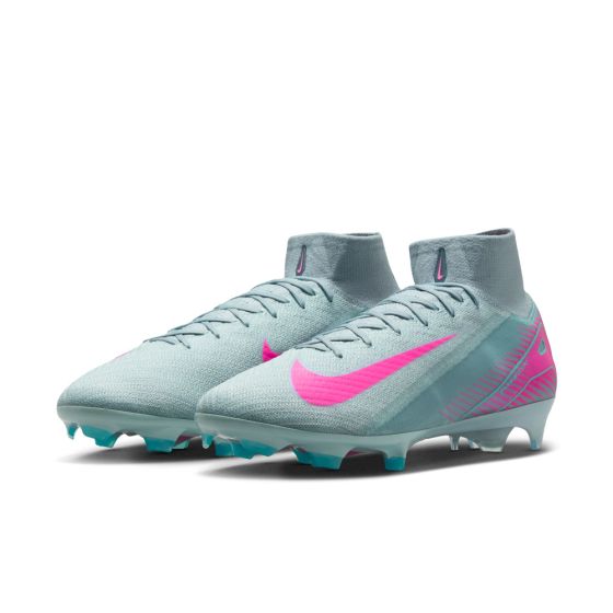 Light blue soccer cleats with pink swoosh logo on a white background