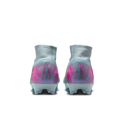 Pair of gray and pink soccer cleats on a white background