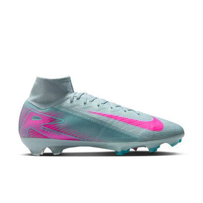 Light blue soccer cleat with pink swoosh logo on a white background