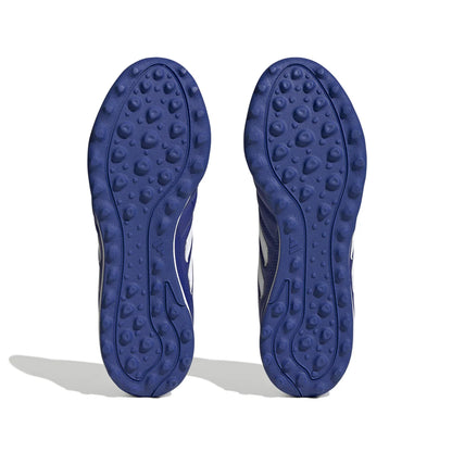 Blue shoe soles with textured pattern on a white background