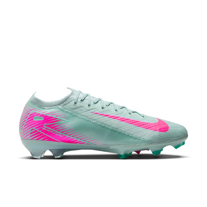 Light blue and pink soccer cleat on a white background